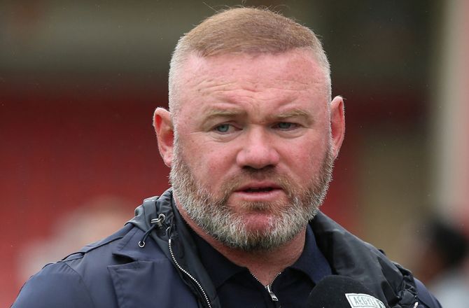 Championship -Rooney hylder Bundu: Han ødelagde deres back