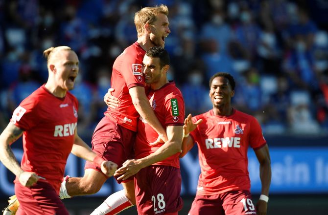Op/nedrykningsspil -FC Köln overlever i BL efter ydmygelse af Kiel